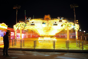 Fast carousel with colorful lights