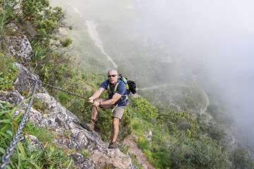 Man climbing on mountain