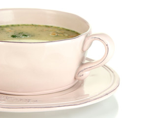 Nourishing soup with vegetables in pan isolated on white