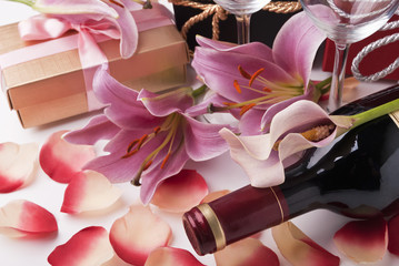 Wine,gift and lilies