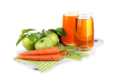Glasses of juice, apples and carrots, isolated on white