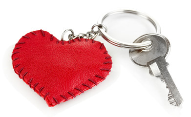 Key with leather trinket isolated on white