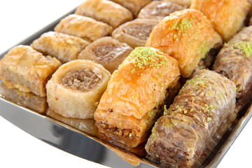 Sweet baklava on tray isolated on white