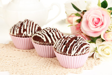 Sweet chocolate cupcakes close up