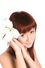 Fototapeta premium The girl with a lily flower