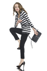 Fototapeta premium young woman in stripy t-shirt and jeans,