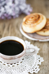 Cup of coffee and sweet buns
