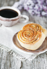 Sweet buns and cup of coffee