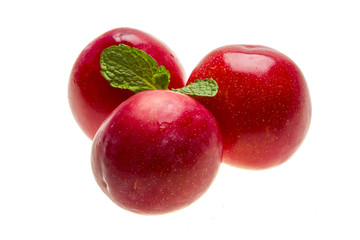 Bright ripe plum with mint
