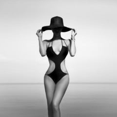 sensual fashion girl on vacation black and white