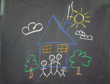 A childs drawing of a happy family at home.