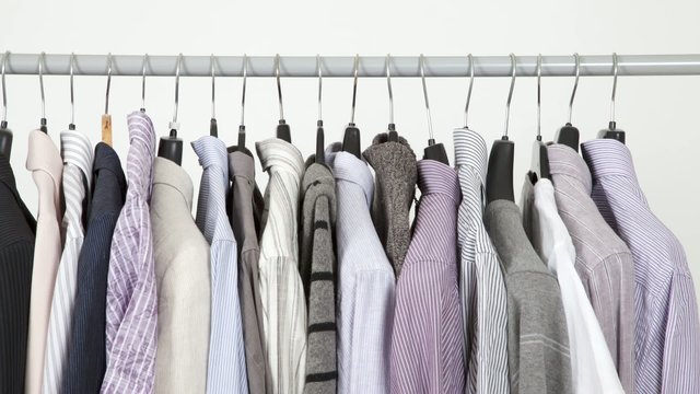 Time lapse of clothes on rack, closeup
