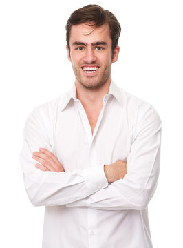 Happy young man in white shirt isolated