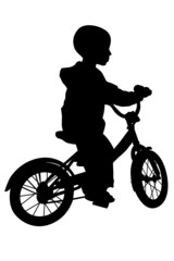 Fototapeta na wymiar boy and bicycle silhouette