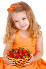 Happy little girl with strawberries