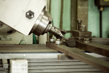 CNC drilling and miling in a workshop