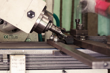 CNC drilling and miling in a workshop