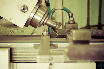 CNC drilling and miling in a workshop