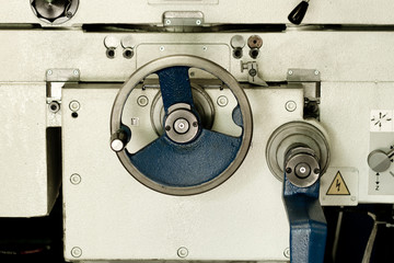 Fototapeta na wymiar detail of lathe machine - colorized photo