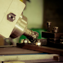 CNC drilling and miling in a workshop