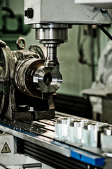 CNC drilling and milling in a workshop