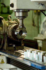 CNC drilling and milling in a workshop