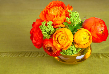 Bouquet of beautiful ranunculus flower in a vase