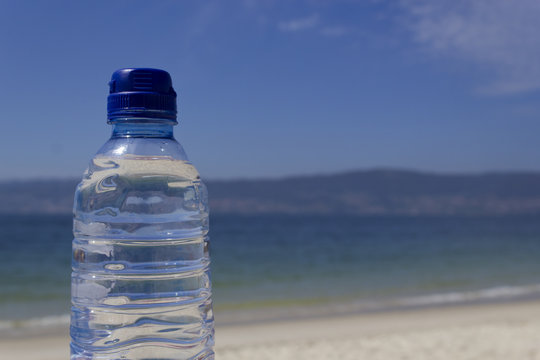 Bottle of water on the seashore