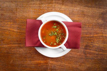 Delicious soup in white dish