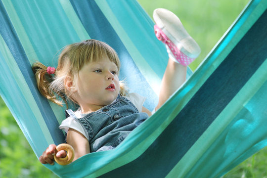 Little Girl In A Hammock