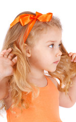 Naklejka premium Portrait of a little girl, isolated on white