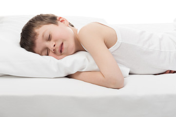 cheerful boy sleep in bed