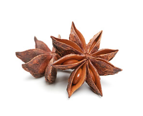 two whole star anise isolated on white background