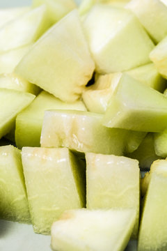 Melon sliced in small pieces,  close up