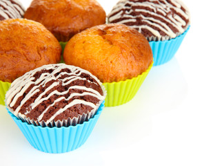 Sweet cupcakes isolated on white