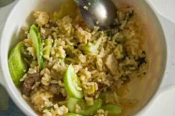 Fried rice with pork on white dish