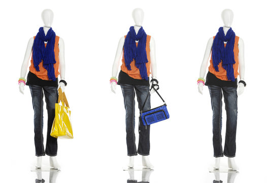 female dress with scarf and in bag on three mannequin