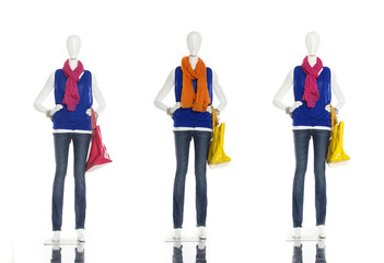 fashion dress with handbag on female three mannequin