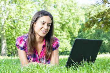 female student using laptop