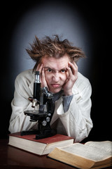 Scientist with microscope