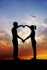 Fototapeta premium Romantic couple at sunset