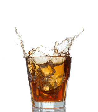 whisky splash isolated on a white background