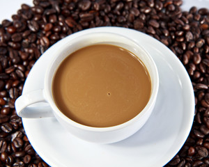 Coffee beans and coffee cup