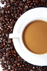 Coffee beans and coffee cup