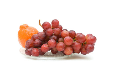grape and tangerine on a white background
