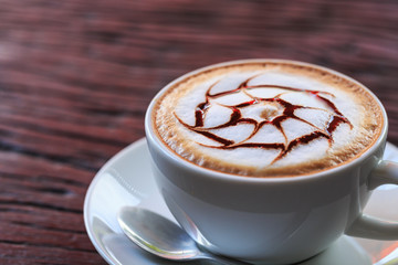 coffee cup on wood background
