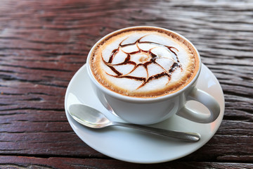coffee cup on wood background