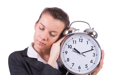 Woman with giant clock on white