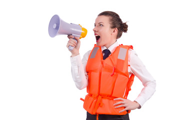 Young woman with vest and loudspeaker on white