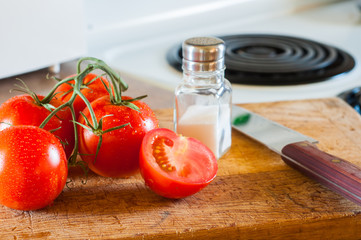 Fresh Tomatoes on a Cutting Board